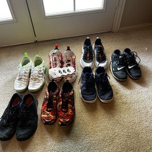 Multiple pairs of mens Nike sneakers
